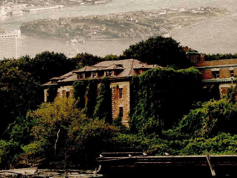 Photograph of North Brother Island showing Riverside Hospital and surrounding grounds circa 1907